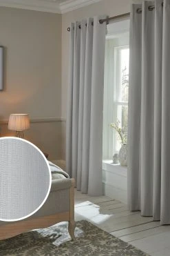 Next Textured Blackout Eyelet Curtains