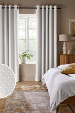 Next Tufted Spot Blackout/Thermal Eyelet Curtains